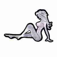 An image of the Sexy Embroidered Trucker Mudflap Girl (Left Facing) (2-Pack) Iron On Patch laying down on a white background.