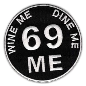 A Jessica Galbreth Zodiac Cancer Sign Iron on Patch that says wine me dine me.