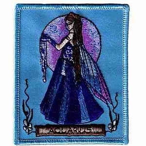 A Jessica Galbreth's Aquarius Zodiac Iron on Patch with an image of a woman in a blue dress.