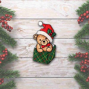 A Bear in Box Patches (2-Pack) Christmas Embroidered Iron on Patch Appliques teddy bear in a santa hat sitting in a gift box.