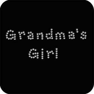 The word Grandma's Girl Iron On Rhinestone Applique on a black background.