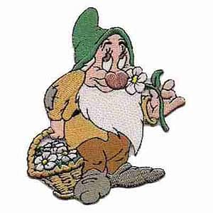 A Disney's Snow White Dwarf Bashful Iron on Patch holding a basket of flowers.