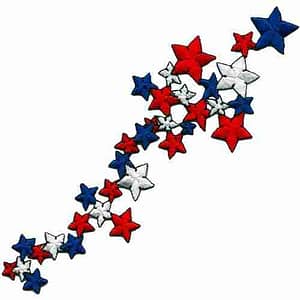 A patriotic falling star spray iron or sew on patch made of red, white and blue stars.