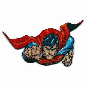 A Superman Fist Flying Iron On Patch flying in the air on a white background.