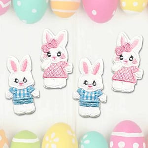 Four Bunny Patches (4-Pack) Easter Embroidered Iron on Patch Appliques surrounded by easter eggs.