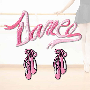A pair of Pink Ballet Dance & Slippers Iron On Patch Pack with the word dance on them.