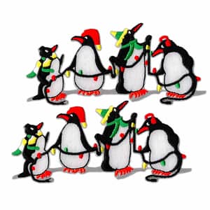 Penguins Patches (2-Pack) Christmas Embroidered Iron On Patch Appliques in santa hats on a white background.