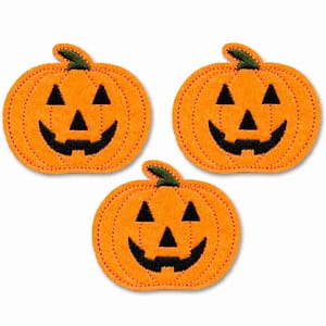 Four Jack O Lantern Patches (3-Pack) Halloween Embroidered Iron On Patch on a white background.