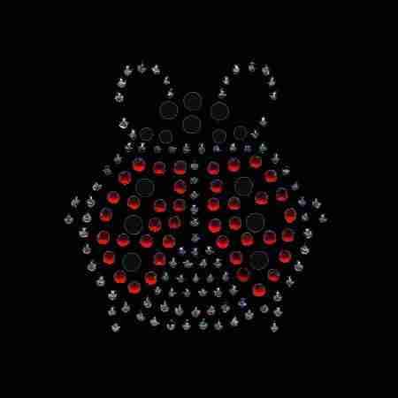 An image of a Rhinestone Ladybug Iron On Hotfix Applique with red dots on a black background.