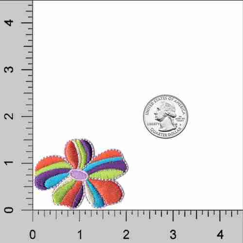 A Multi-Colored Flower Patches (5-Pack) Flower Embroidered Iron On Patch Appliques embroidered on a ruler.