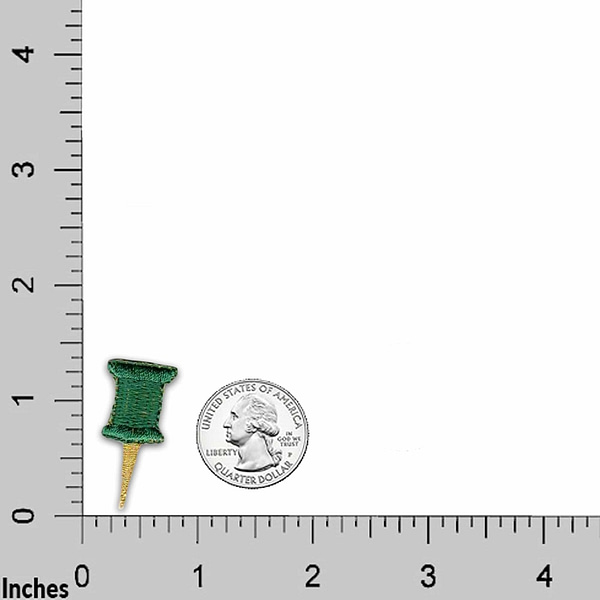 A green Red 57 Chevy (2-Pack) Iron On Patch next to a ruler.
