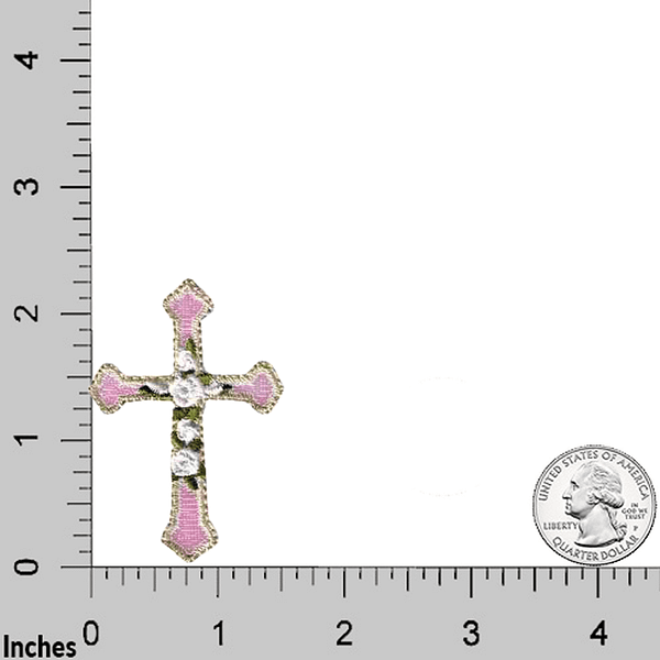 A pink and white Cross w/ Roses Patches (5-Pack) Religious Embroidered Iron On Patch Applique on a ruler.