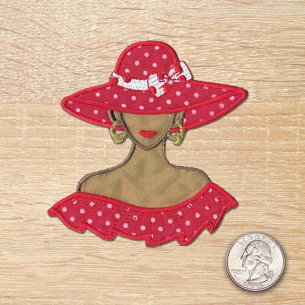 A woman wearing a Tan Red Hat Polka Dot Lady Iron On Patch - Small and polka dot dress.