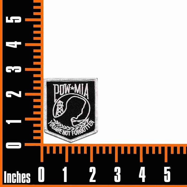 A black and orange POW-MIA Military Style Small Iron On Patch with a ruler on it.