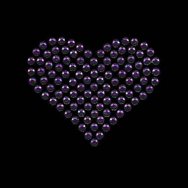 A Rhinestud Heart Iron On Hotifx Applique: Medium - Purple made of purple beads on a black background.