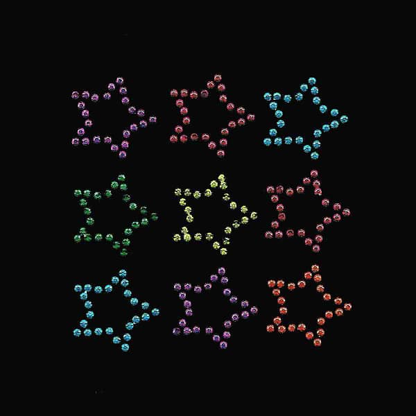 A group of Multi-colored Sheet of Tiny Rhinestud HotFix Stars on a black background.
