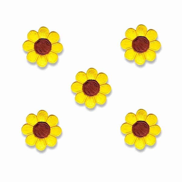 A group of cute daisy patches (5 pack) flower embroidered iron on patch appliques - 4 color choices! on a white background.