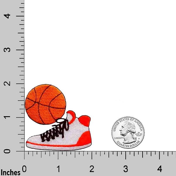 A Sneaker & Ball Patches (2-Pack) Sports Embroidered Iron On Patch Applique and a coin next to a ruler.