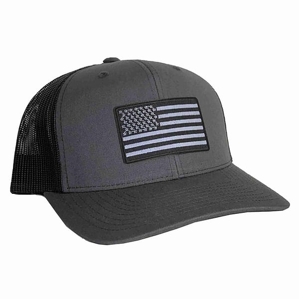 A black hat with the Black & Gray USA Flag Patches (2-Pack) American Flag Embroidered Iron On Appliques on it.