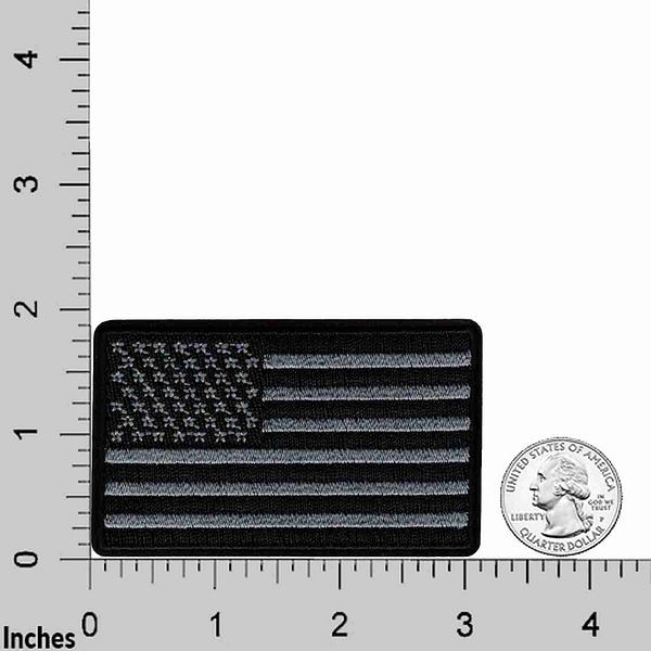Black & Gray USA Flag Patches (2-Pack) American Flag Embroidered Iron On Appliques on a ruler.