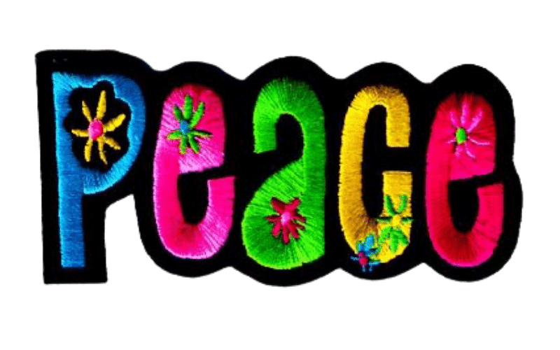 A colorful sign with the word peace on it.