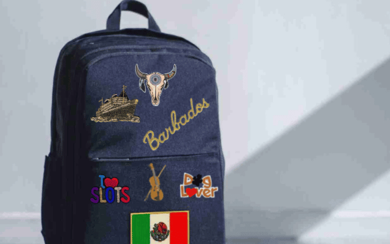 A backpack with various mexican symbols on it.