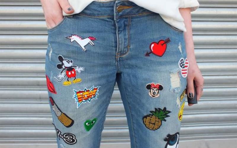 How to Patch Jeans With Iron on Patches - Laughing Lizards